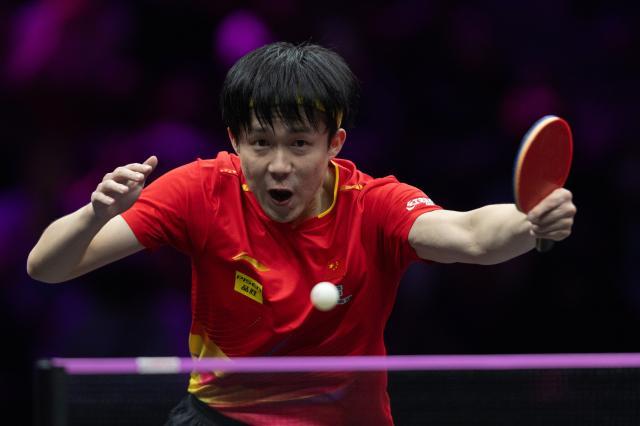 1741959160371052044.jpg (体育)(7)乒乓球——WTT重庆冠军赛:王楚钦晋级八强XxjpseC007315_20250314_PEPFN0A001.jpg
